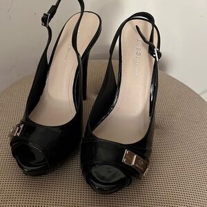 BCBGeneration patent black high heel shoes Size 7M